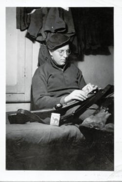 Probable platoon buddy in unidentified barracks location, most likely in France during winter of 1944.