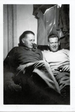 Probable platoon buddies in unidentified barracks location, most likely in France during winter of 1944.